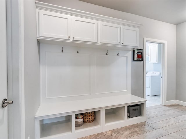1417 Atalon Dr, Moore, OK 73160 - mudroom featuring washer / dryer and baseboards