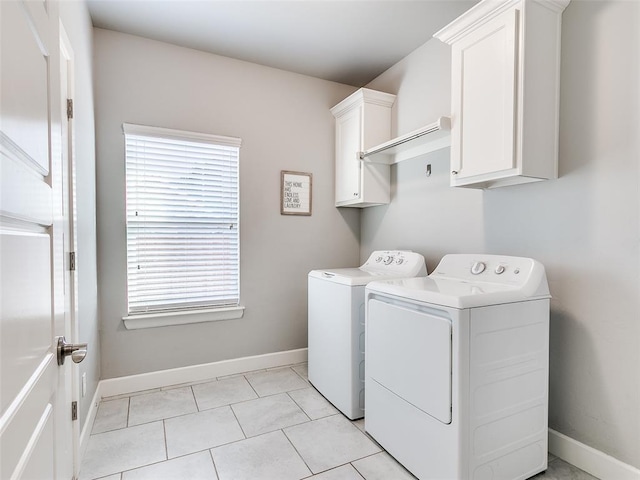 1417 Atalon Dr, Moore, OK 73160 - washroom featuring washing machine and dryer, cabinet space, plenty of natural light, and light tile patterned floors