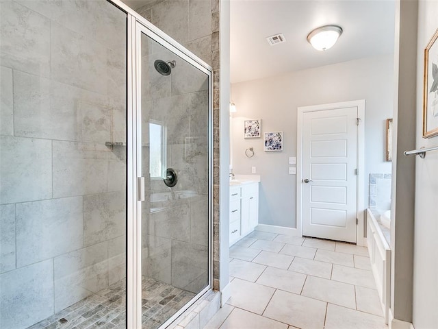 1417 Atalon Dr, Moore, OK 73160 - full bath featuring a stall shower, vanity, a bath, and tile patterned floors