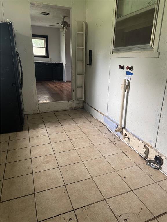 201 S Oak St, Pauls Valley, OK 73075 - interior space with light tile patterned floors and a ceiling fan