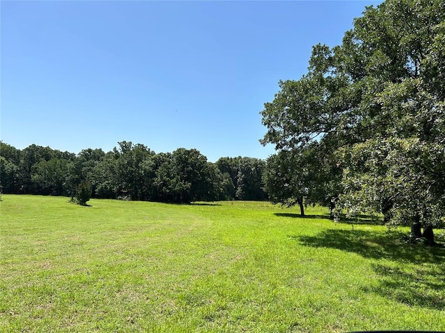 344393 E 930th Rd, Chandler, OK 74834 - view of grassy yard featuring a view of trees and a view of countryside