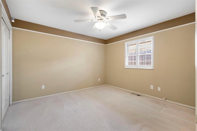 2709 NW 60th St, Oklahoma City, OK 73112 - spare room with a ceiling fan and carpet