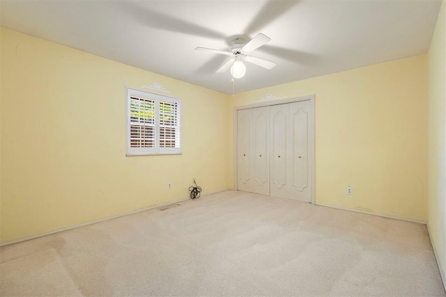 2709 NW 60th St, Oklahoma City, OK 73112 - unfurnished bedroom featuring carpet flooring, a closet, and ceiling fan