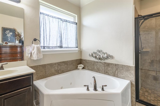 3101 Firewheel Rd, Edmond, OK 73013 - full bath featuring a stall shower, a jetted tub, and vanity