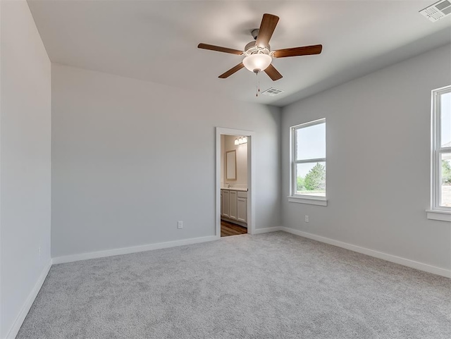 13172 Mannington Rd, Edmond, OK 73025 - carpeted empty room with ceiling fan and baseboards