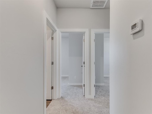 13172 Mannington Rd, Edmond, OK 73025 - corridor with carpet flooring and baseboards