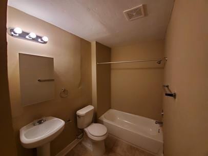 full bathroom featuring bathtub / shower combination and tile patterned floors