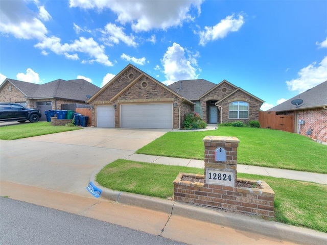 12824 NW 6th St, Yukon, OK 73099 - view of front of house featuring an attached garage, concrete driveway, and brick siding