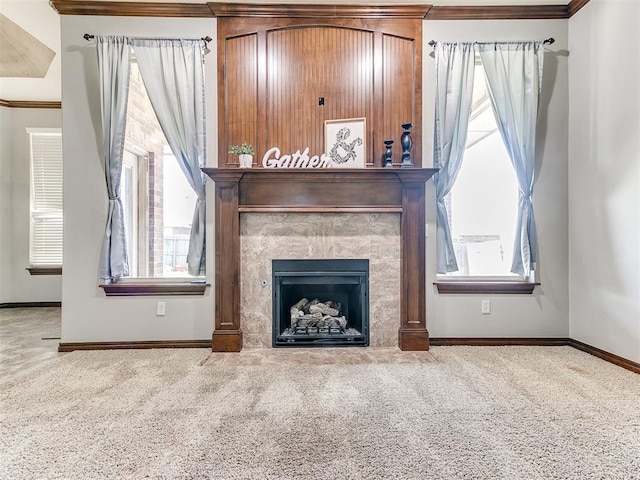 12824 NW 6th St, Yukon, OK 73099 - living area with carpet floors, ornamental molding, plenty of natural light, and a fireplace with flush hearth