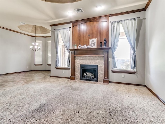 12824 NW 6th St, Yukon, OK 73099 - unfurnished living room featuring a chandelier, carpet flooring, a premium fireplace, and ornamental molding