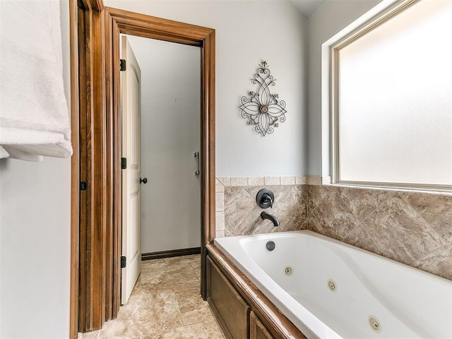12824 NW 6th St, Yukon, OK 73099 - bathroom featuring a tub with jets