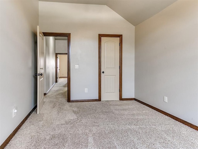 12824 NW 6th St, Yukon, OK 73099 - unfurnished bedroom with light carpet and vaulted ceiling