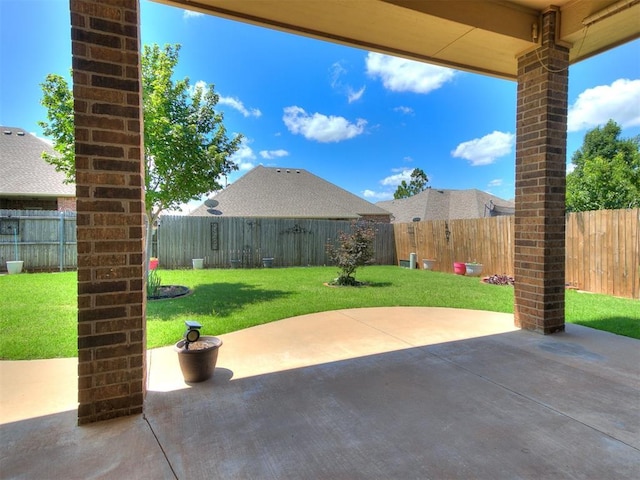12824 NW 6th St, Yukon, OK 73099 - fenced backyard with a patio
