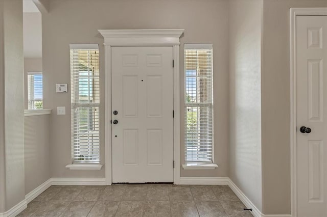 600 Nathan Way, Yukon, OK 73099 - foyer with baseboards and light tile patterned floors