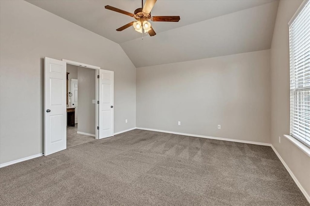 600 Nathan Way, Yukon, OK 73099 - unfurnished bedroom with vaulted ceiling, carpet floors, and a ceiling fan