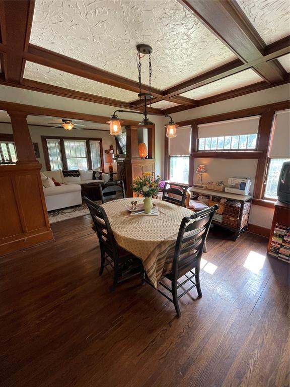 1845 W Park Pl, Oklahoma City, OK 73106 - dining room featuring coffered ceiling, dark wood-style floors, beam ceiling, ornamental molding, and a ceiling fan
