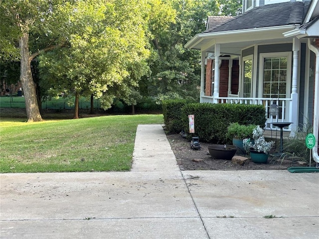 1800 N Elm Ave, Shawnee, OK 74804 - view of green lawn featuring covered porch