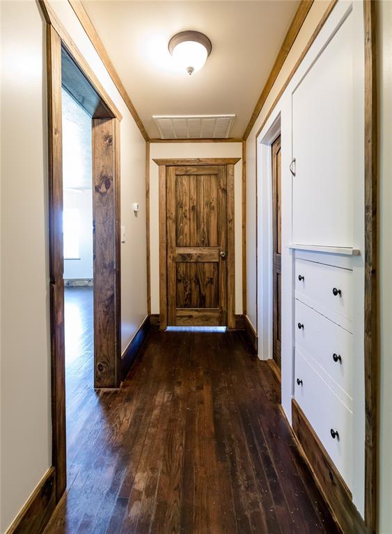 22807 E 1070th Rd, Clinton, OK 73601 - hall with hardwood / wood-style flooring and baseboards