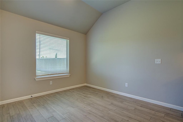 9120 NW 123rd St, Yukon, OK 73099 - unfurnished room with light wood-style flooring and lofted ceiling