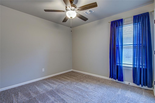9120 NW 123rd St, Yukon, OK 73099 - carpeted spare room with a ceiling fan and baseboards