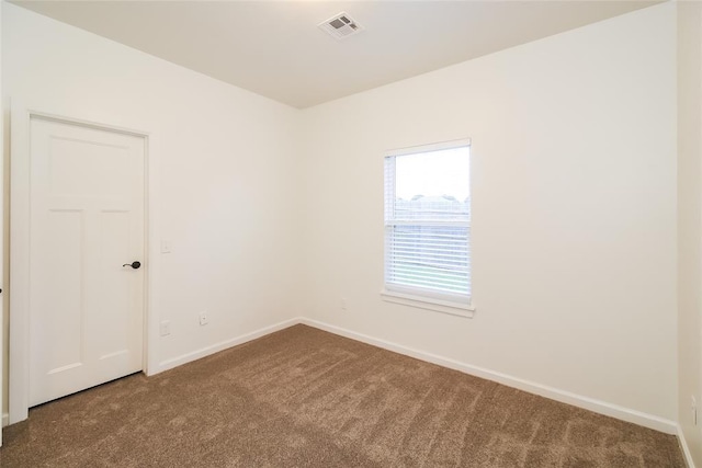 10928 NW 38th Ter, Yukon, OK 73099 - empty room with carpet and baseboards