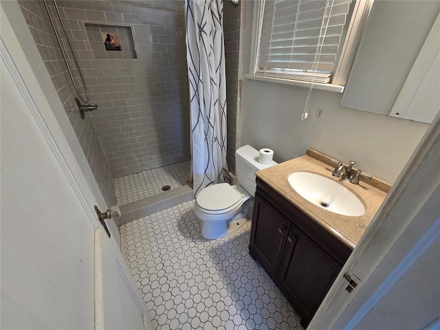 1103 S Hadden Ave, El Reno, OK 73036 - full bathroom with a stall shower, vanity, and tile patterned floors