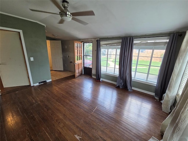 1103 S Hadden Ave, El Reno, OK 73036 - unfurnished living room with wood finished floors, a ceiling fan, and lofted ceiling