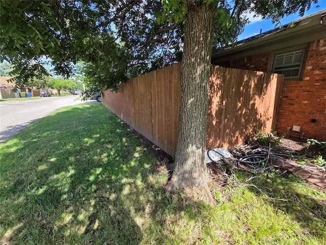 1103 S Hadden Ave, El Reno, OK 73036 - view of property exterior with brick siding