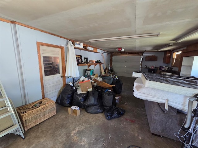 1103 S Hadden Ave, El Reno, OK 73036 - garage featuring a garage door opener