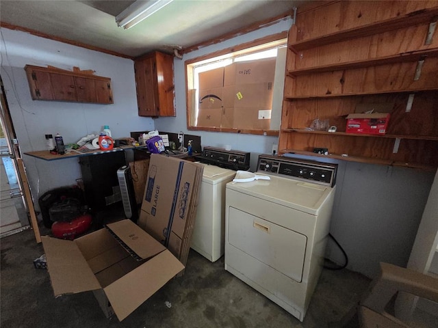 1103 S Hadden Ave, El Reno, OK 73036 - laundry area with independent washer and dryer and cabinet space