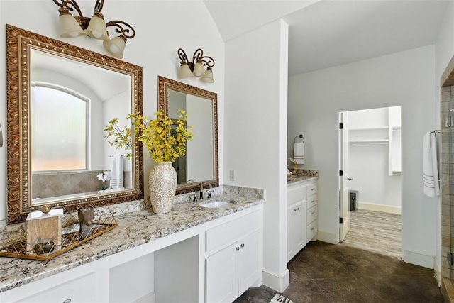 15016 Kurdson Way, Edmond, OK 73013 - full bath featuring double vanity, tiled shower, and a chandelier
