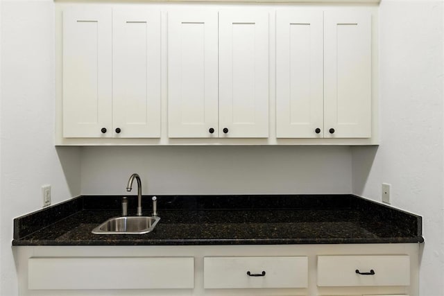 15016 Kurdson Way, Edmond, OK 73013 - kitchen with white cabinets and dark stone countertops
