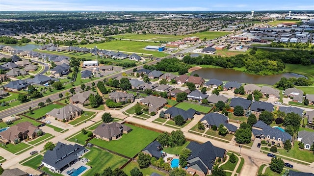 15016 Kurdson Way, Edmond, OK 73013 - aerial view of property and surrounding area with a large body of water and nearby suburban area