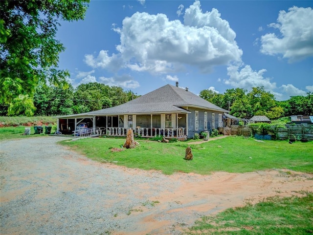 4255 SE 120th Ave, Norman, OK 73026 - back of house featuring covered porch and driveway