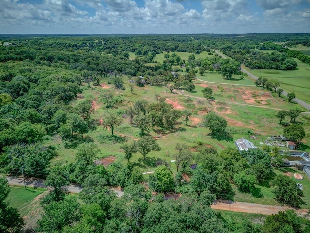 4255 SE 120th Ave, Norman, OK 73026 - aerial view of property and surrounding area with a heavily wooded area