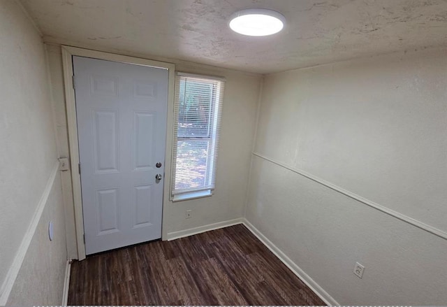 1325 SW 28th St, Oklahoma City, OK 73108 - entrance foyer featuring dark wood-style flooring and baseboards