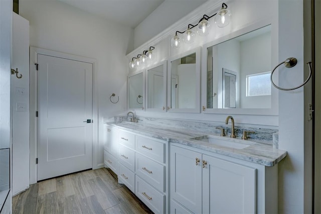 13337 SE 95th St, Oklahoma City, OK 73165 - full bath featuring double vanity and wood finished floors