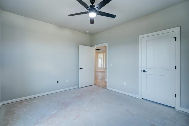 13337 SE 95th St, Oklahoma City, OK 73165 - unfurnished bedroom with concrete floors and a ceiling fan
