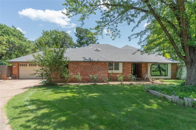 1404 Oak Dr, Edmond, OK 73034 - ranch-style home with a garage, driveway, brick siding, and a shingled roof