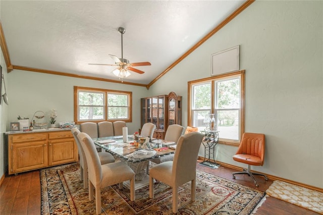 1404 Oak Dr, Edmond, OK 73034 - dining area featuring ornamental molding, lofted ceiling, hardwood / wood-style floors, and a ceiling fan