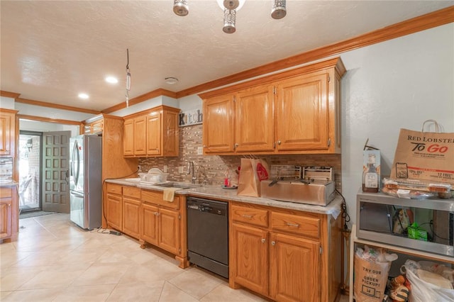 1404 Oak Dr, Edmond, OK 73034 - kitchen with dishwashing machine, freestanding refrigerator, ornamental molding, tasteful backsplash, and light countertops