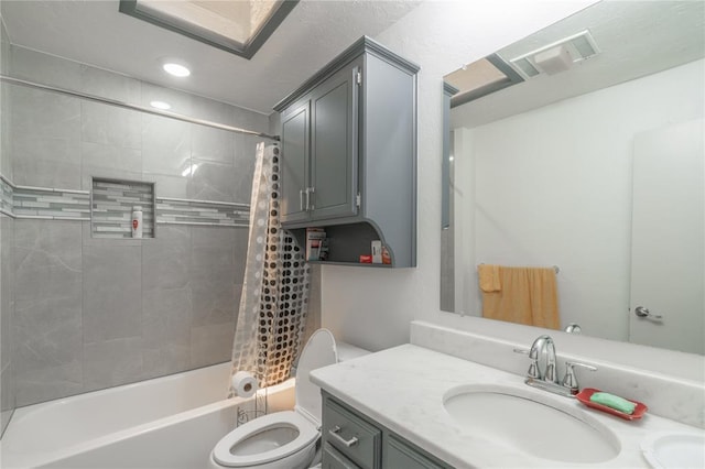 1404 Oak Dr, Edmond, OK 73034 - bathroom with vanity, shower / bath combo with shower curtain, and recessed lighting