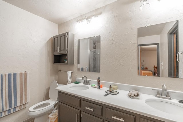 1404 Oak Dr, Edmond, OK 73034 - bathroom with double vanity and a textured wall
