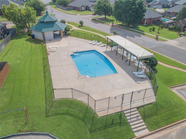 201 NW 160th Ter, Edmond, OK 73013 - community pool with a gazebo, a patio, and a residential view