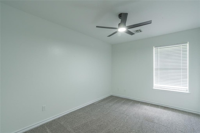 201 NW 160th Ter, Edmond, OK 73013 - spare room featuring a ceiling fan and carpet