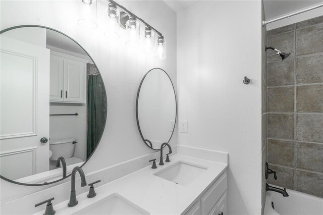 201 NW 160th Ter, Edmond, OK 73013 - bathroom with double vanity and shower / bathtub combination with curtain