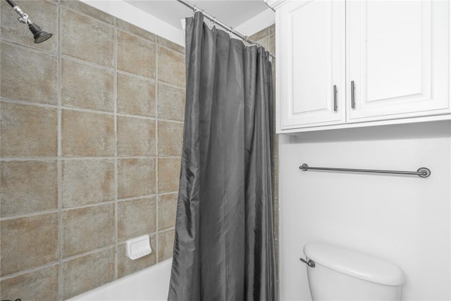 201 NW 160th Ter, Edmond, OK 73013 - bathroom featuring shower / tub combo and toilet