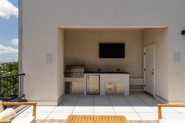 907 NW 9th St Unit B, Oklahoma City, OK 73106 - view of patio / terrace featuring exterior kitchen