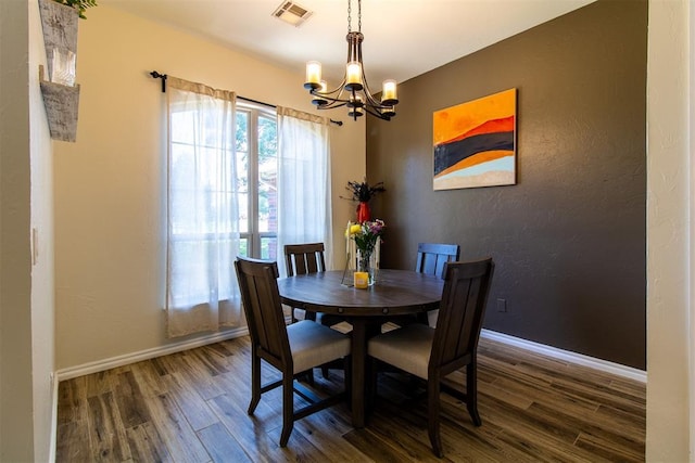 10517 SE 49th St, Oklahoma City, OK 73150 - dining room featuring a chandelier and wood finished floors