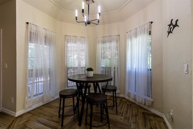 10517 SE 49th St, Oklahoma City, OK 73150 - dining space featuring a chandelier and a textured wall